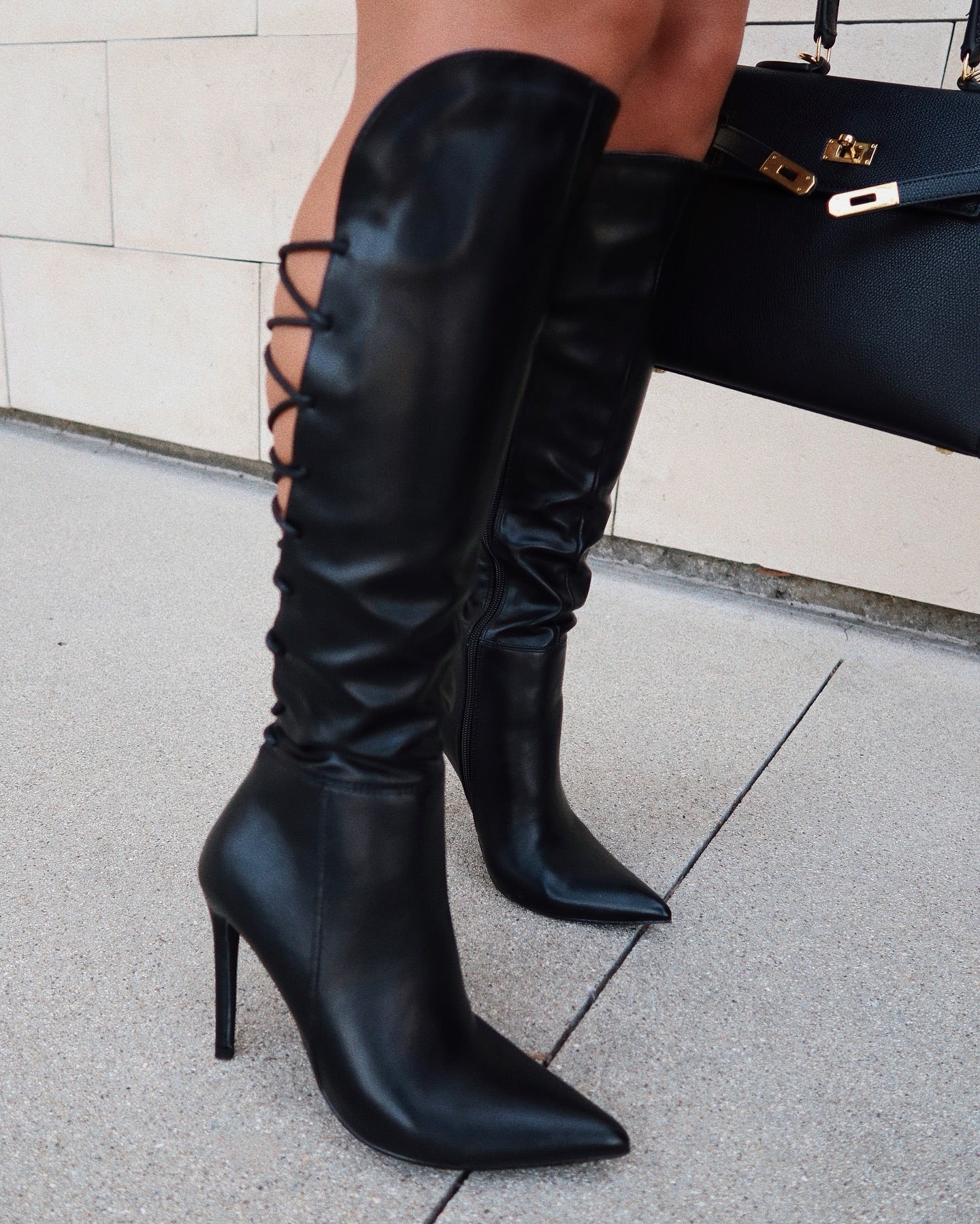 Black lace-up high-heeled boots